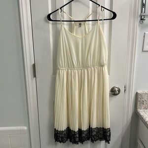 Lovely pleated cream color dress
